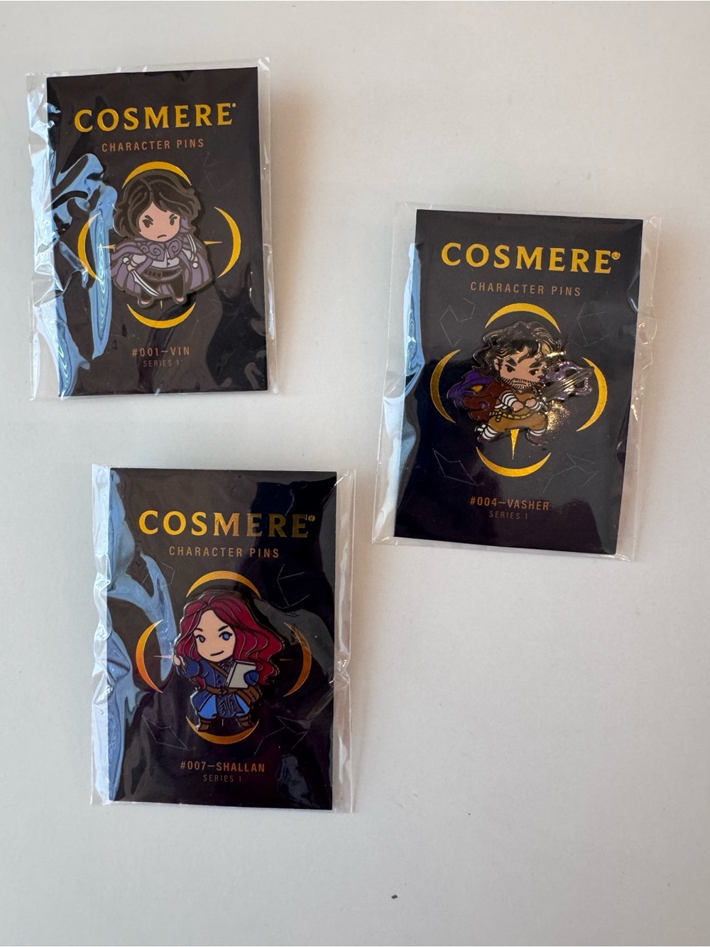Dragonsteel Cosmere Character Pin Set - Vin 001, Vasher 004, Shallan 007
